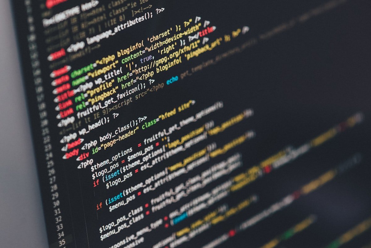 Source code on screen: custom software development at GEJ Solutions